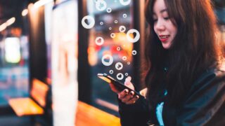 woman looking at phone