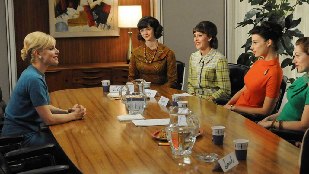 1950s women around board room table