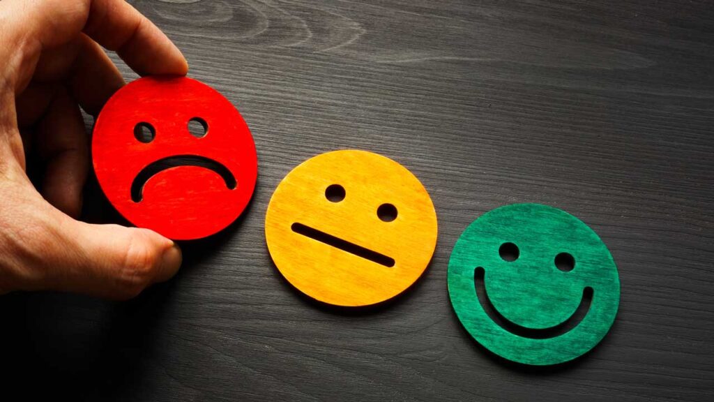 sad, meh, and happy face