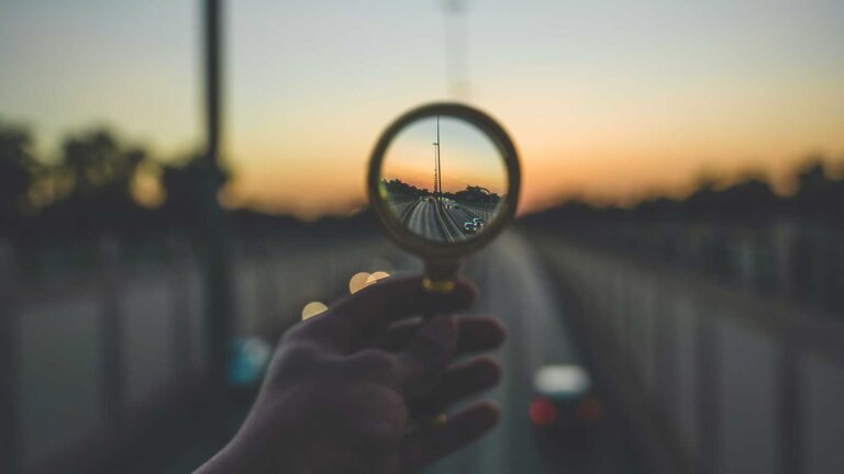 magnifying glass looking at road