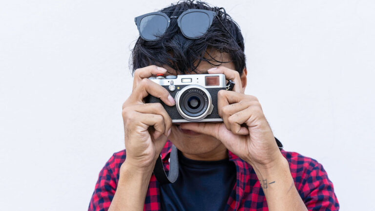 person with vintage camera