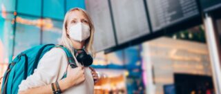 traveling woman with mask on