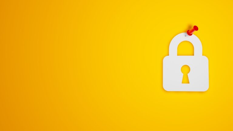 padlock pinned to wall