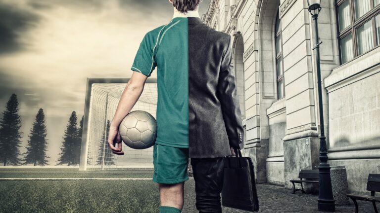 man half in soccer kit half in suit