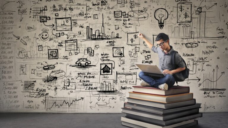 man sitting on stack of books with wall full of equations