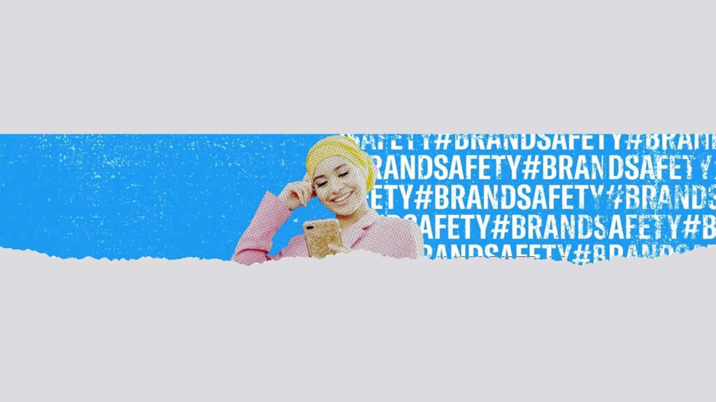 woman with headscarf smiling against background of brand safety words