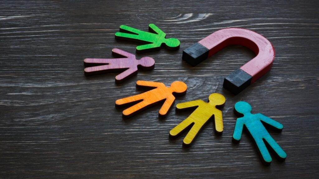 human cut outs and a magnet