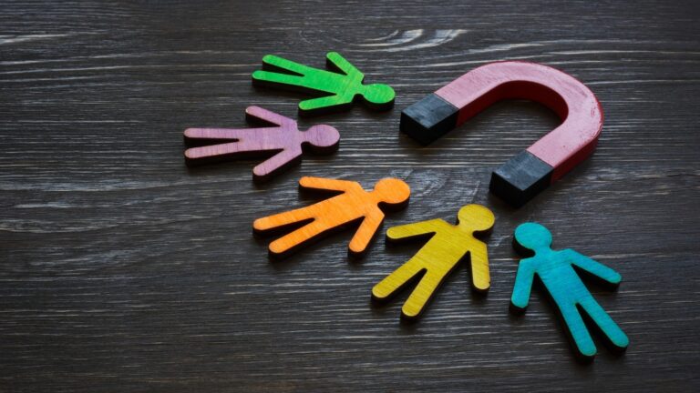 human cut outs and a magnet