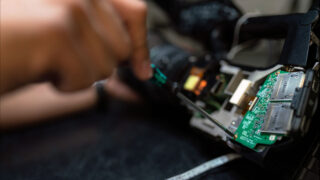 image of electronics being repaired