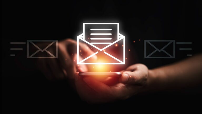 Businessman using smartphone to open e-mail for business contact and communication concept.