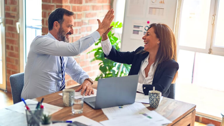 A man and a woman networking for business