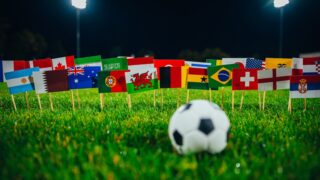 All nations flag of FIFA Football World Cup 2022 in Qatar. Fans support concept photo.