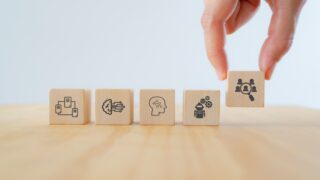 Hyper-personalization concept on wooden cubes. Personalized marketing with automation technology, artificial intelligence(ai) and machine learning.