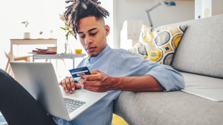 Young man working at home stock photo