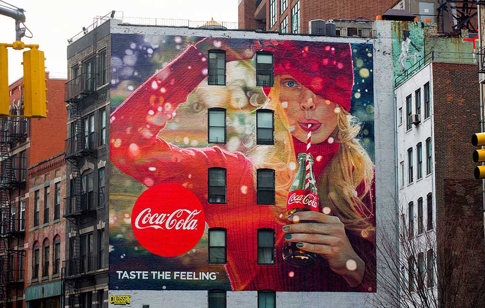 coca cola add on side of building