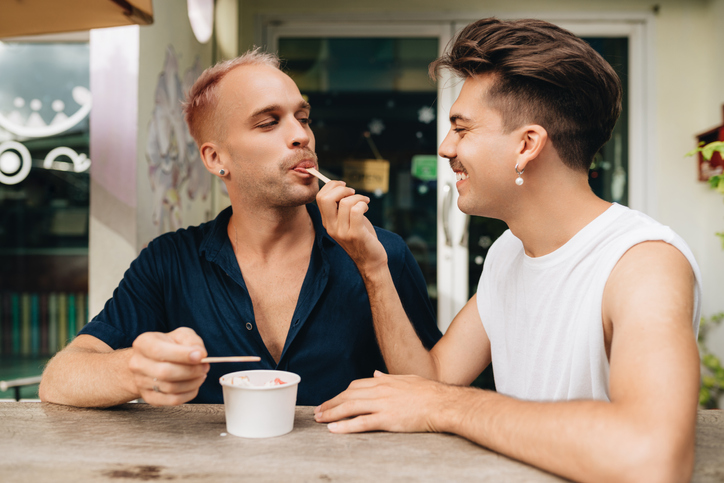 Gay Couple spends time together outdoors.